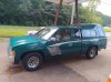 95_nissan_king_cab_with_camper_lf.jpg
