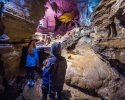 The-boys-explore-the-rock-formations-of-Secret-Caverns-in-Howes-Caves-New-York-1777156449.jpg