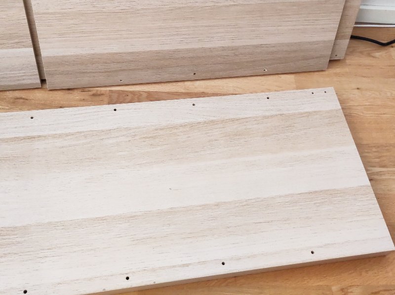 Dowel holes, bottom row dividers, 2